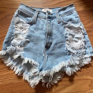 Ripped high wasted denim shorts
